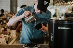 man making a gourmet coffee