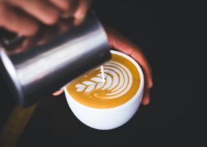 preparing a latte